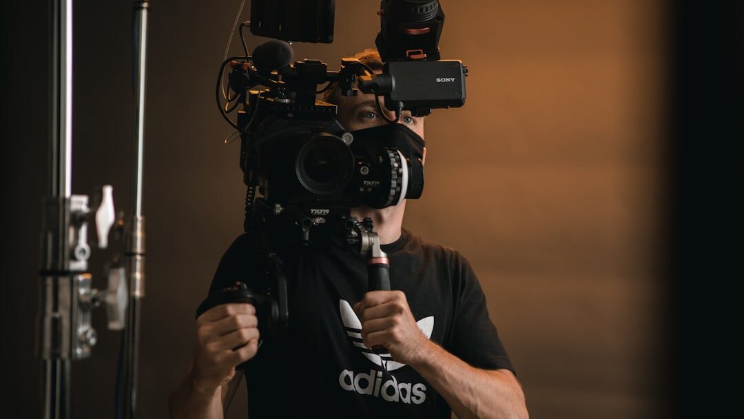 Television studio control room with camera operator filming a live broadcast